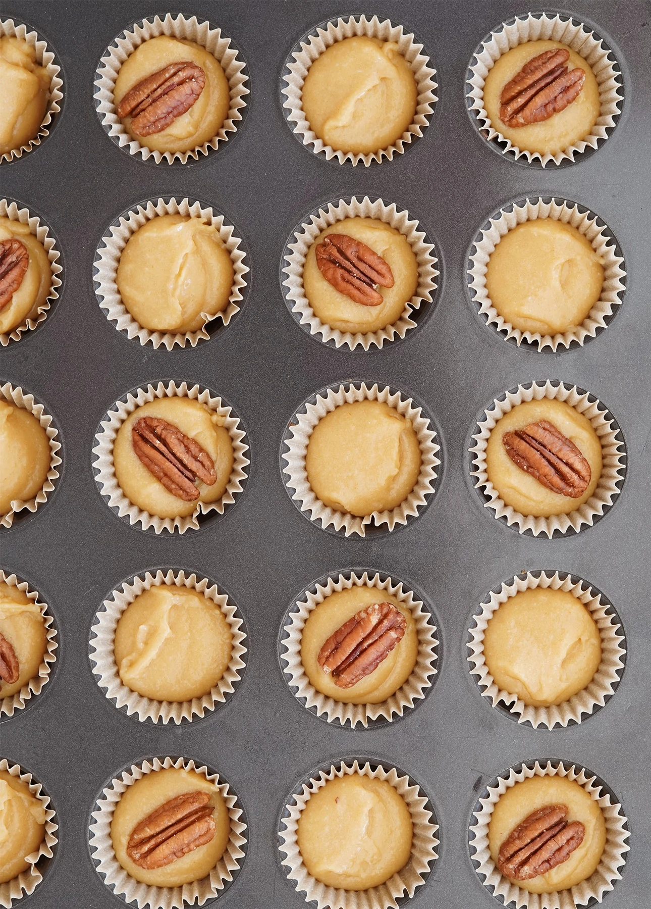 Maple financiers with decorative pecan nuts, before baking // FoodNouveau.com