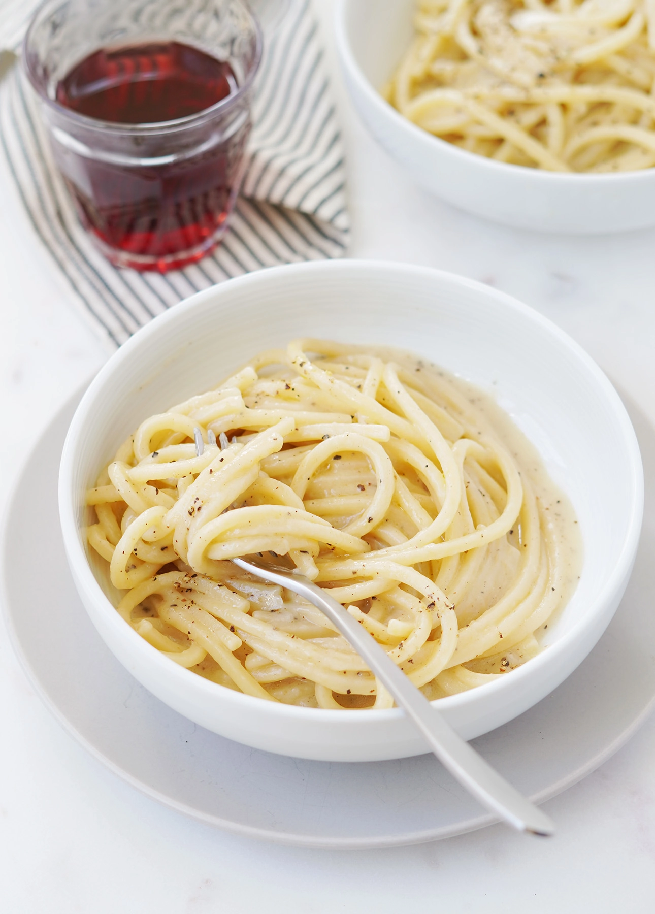 A serving of Cacio e Pepe, one of four quintessential Roman pasta dishes // FoodNouveau.com